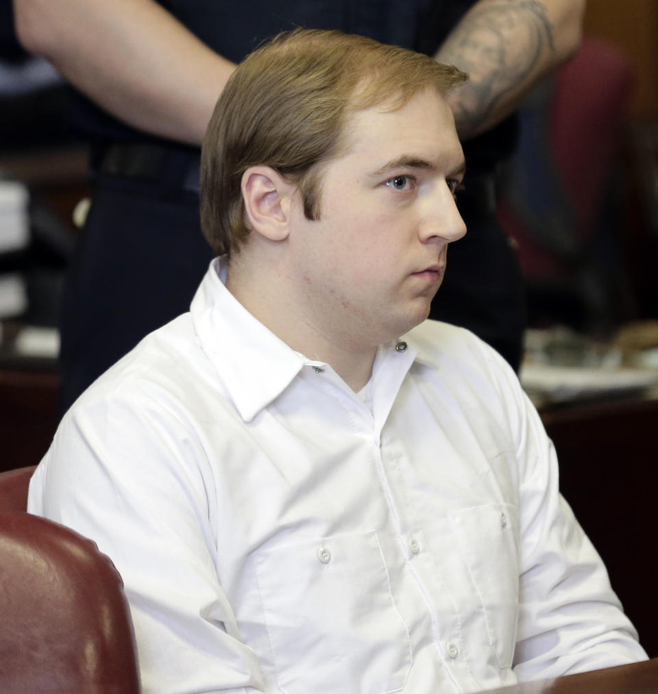 James Jackson appears in court for sentencing in New York, Wednesday, Feb. 13, 2019. Jackson, a white supremacist, pled guilty to killing a black man with a sword as part of a racist plot that prosecutors described as a hate crime and was sentenced to life in prison without parole. (AP Photo/Seth Wenig)