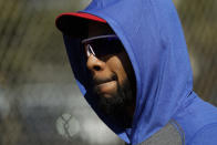 Texas Rangers' Elvis Andrus walks between drills during spring training baseball practice Monday, Feb. 17, 2020, in Surprise, Ariz. (AP Photo/Charlie Riedel)