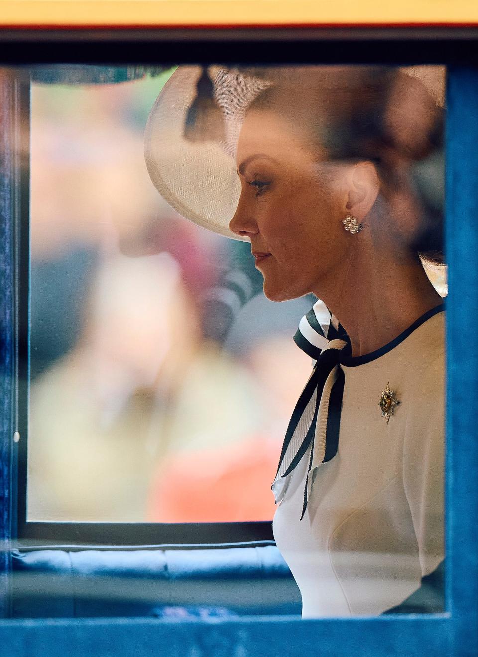 Catherine, Princess of Wales, rides inside the Glass State Coach at Horse Guards Parade during the King's Birthday Parade "Trooping the Colour" in London on June 15, 2024