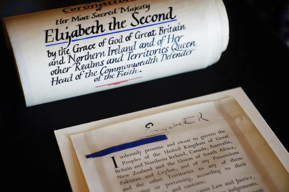 The Coronation Roll of Queen Elizabeth II on display at Buckingham Palace, central London before King Charles III and Queen Camilla are presented with their own Coronation Roll, an official record of their Coronation, Wednesday May 1, 2024. King Charles III gaped at the 70-foot-long (21.4-meter) hand-lettered scroll as it was presented to him earlier this week at Buckingham Palace, thanking the artisans who produced the document that serves as the official record of his coronation almost a year ago. (Victoria Jones/PA via AP)