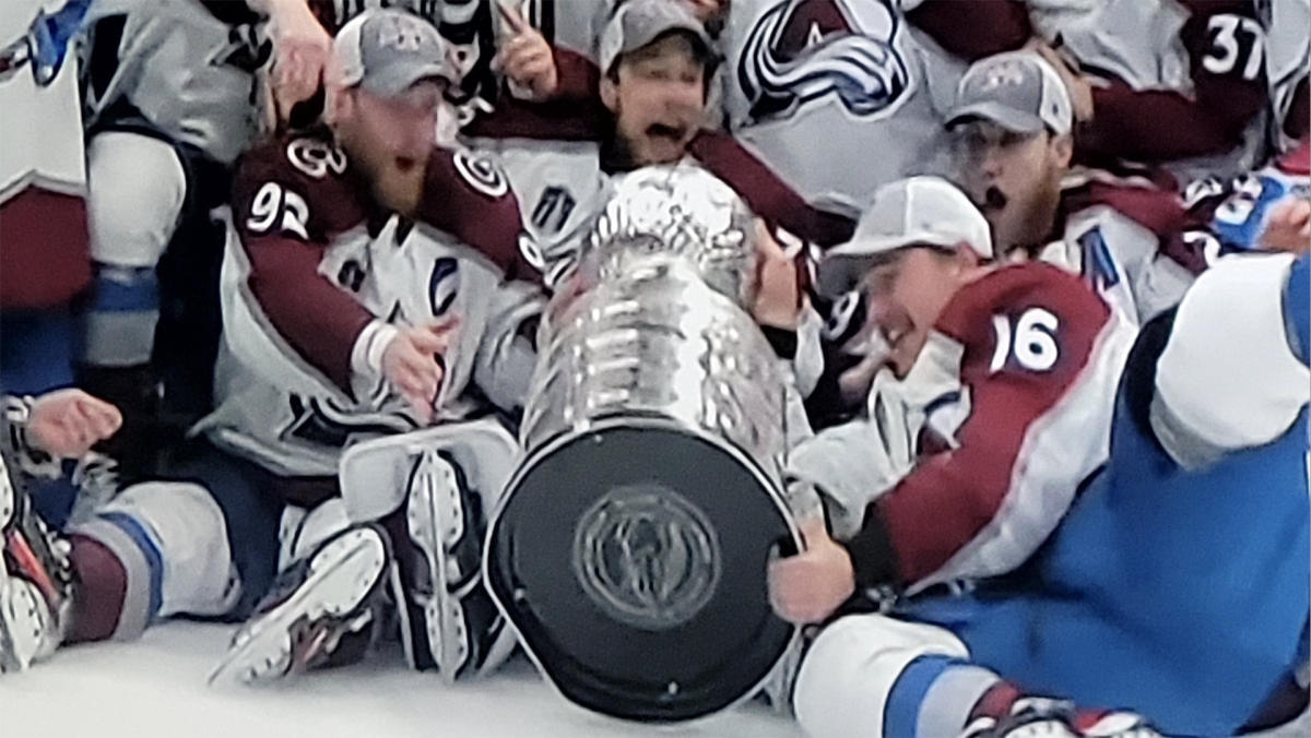 Avalanche Player Wipes Out With Stanley Cup Right Before Team Trophy Photo  - Sports Illustrated