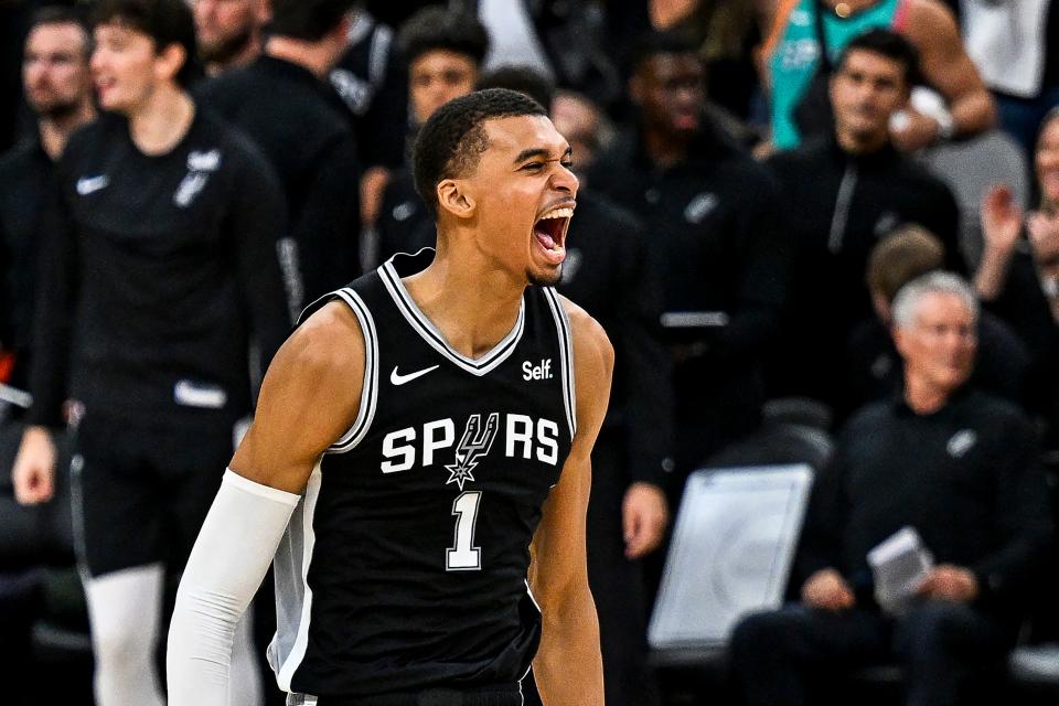 French forward-center #01 Victor Wenbanyama of the San Antonio Spurs celebrates after winning the NBA basketball game between the Houston Rockets and the San Antonio Spurs at AT&T Center on October 27, 2023 in San Antonio, Texas.  (Photo by CHANDAN KHANNA/AFP) (Photo by CHANDAN KHANNA/AFP via Getty Images)