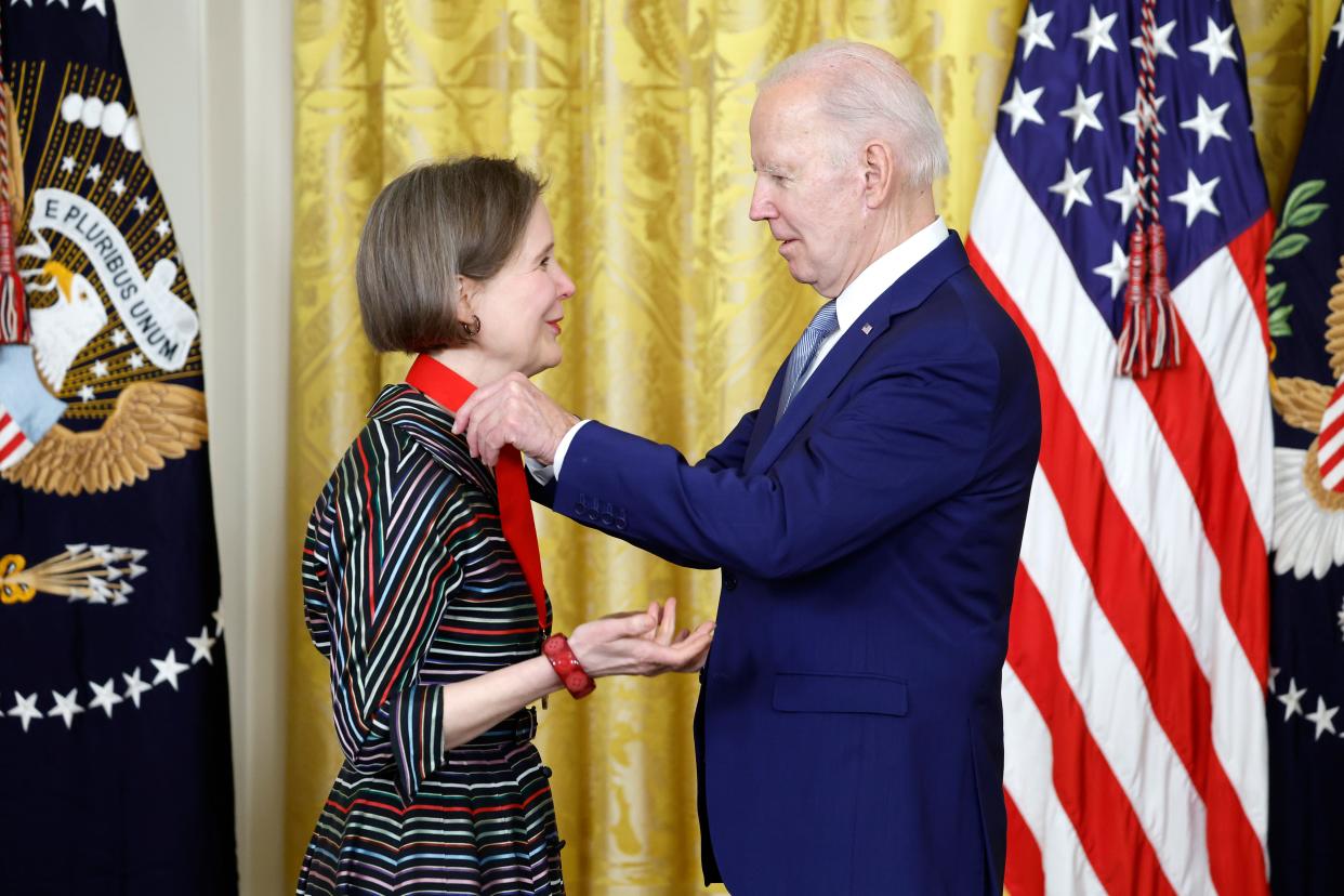 WASHINGTON, DC - MARCH 21: U.S. President Joe Biden awards author Ann Patchett a 2021 National Humanities Medal during a ceremony in the East Room of the White House on March 21, 2023 in Washington, DC. The awards ceremony is the first for Biden, who was delayed in hosting the awards at the time due to the pandemic. (Photo by Anna Moneymaker/Getty Images) ORG XMIT: 775956564 ORIG FILE ID: 1475138582