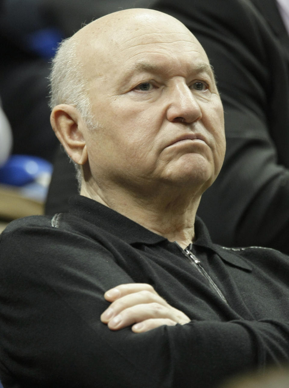 FILE - In this Sunday, April 17, 2011 file photo, former Moscow Mayor Yuri Luzhkov attends a Fed Cup World Group semifinal tennis match between Russia and Italy in Moscow, Russia. The former mayor of Moscow and one of the founders of Russia's ruling United Russia party, Yuri Luzhkov, has died at the age of 83. Russia's Ren TV channel reported Tuesday Dec. 10, 2019, that Luzhkov died in Munich, where he was undergoing heart surgery. (AP Photo/Misha Japaridze, File)