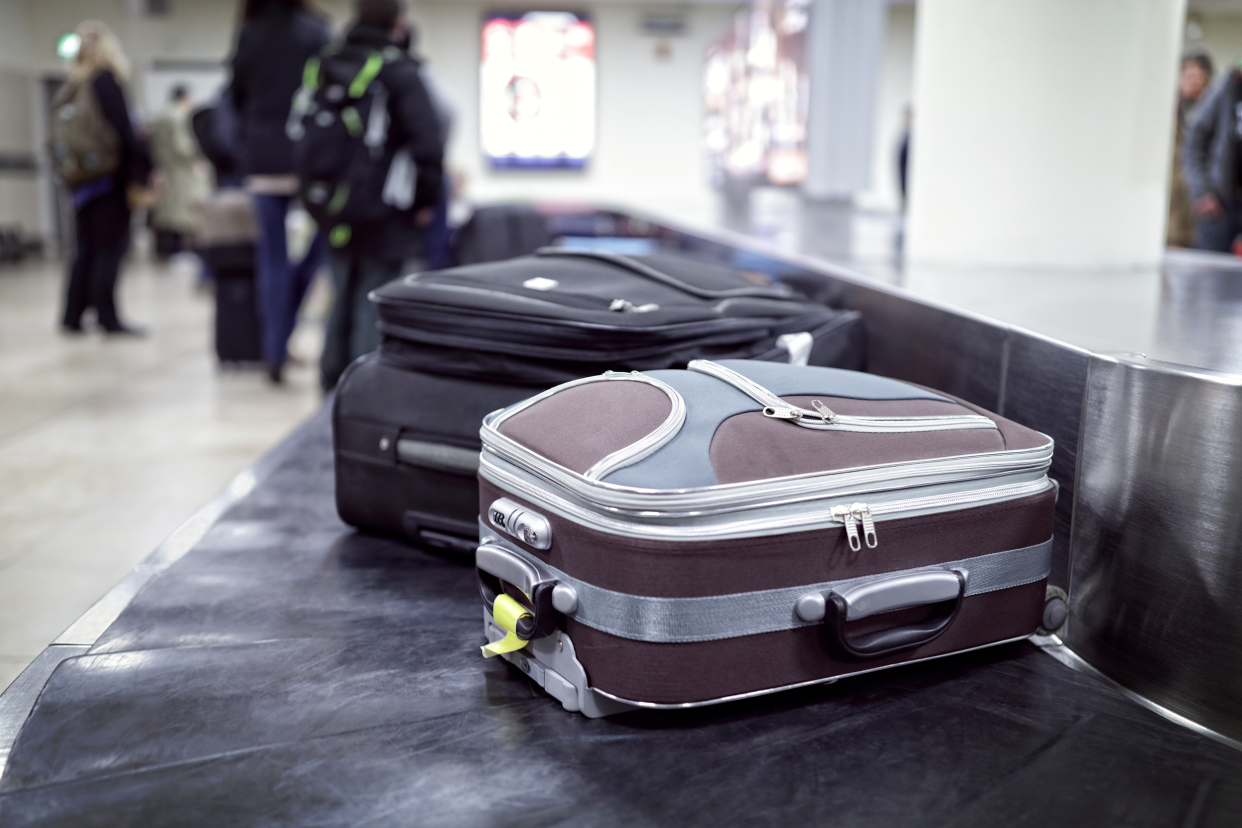 Luggage on a baggage claim conveyor belt