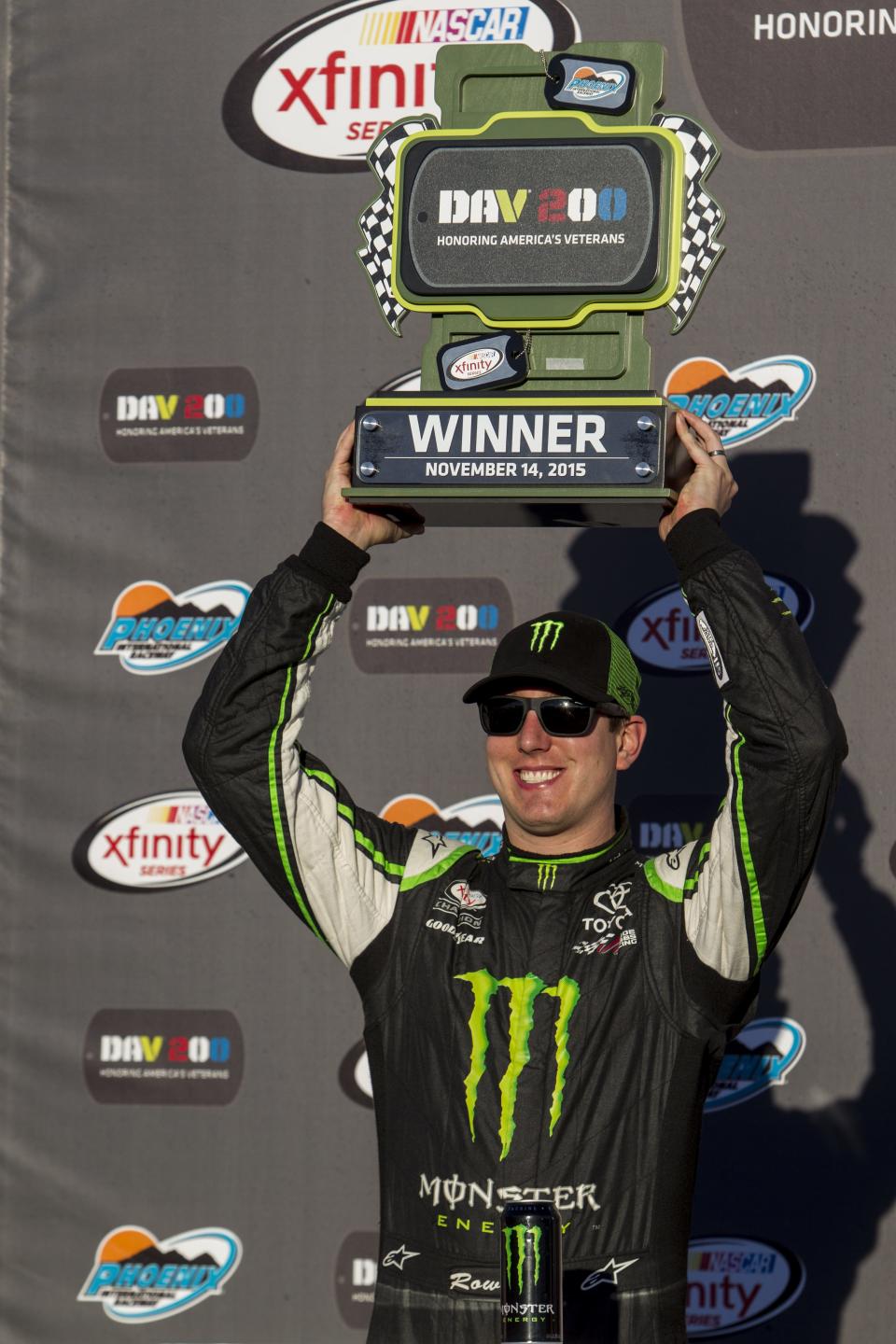 Kyle Busch celebrates winning the NASCAR Xfinity Series DAV 200 Honoring America's Veterans at Phoenix International Raceway on Nov. 14, 2015 Busch led for 190 laps out of 200.