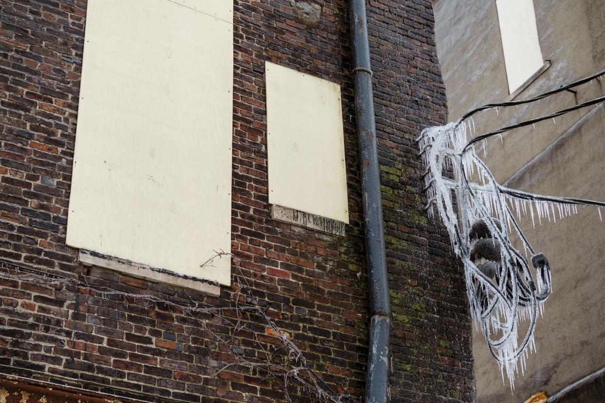 An icy cluster of power lines are seen on a boarded up building on February 11, 2021 in Louisville, Kentucky. The region was showered with sleet and snow that year in an event the National Weather Service has credited to a polar vortex phenomenon.