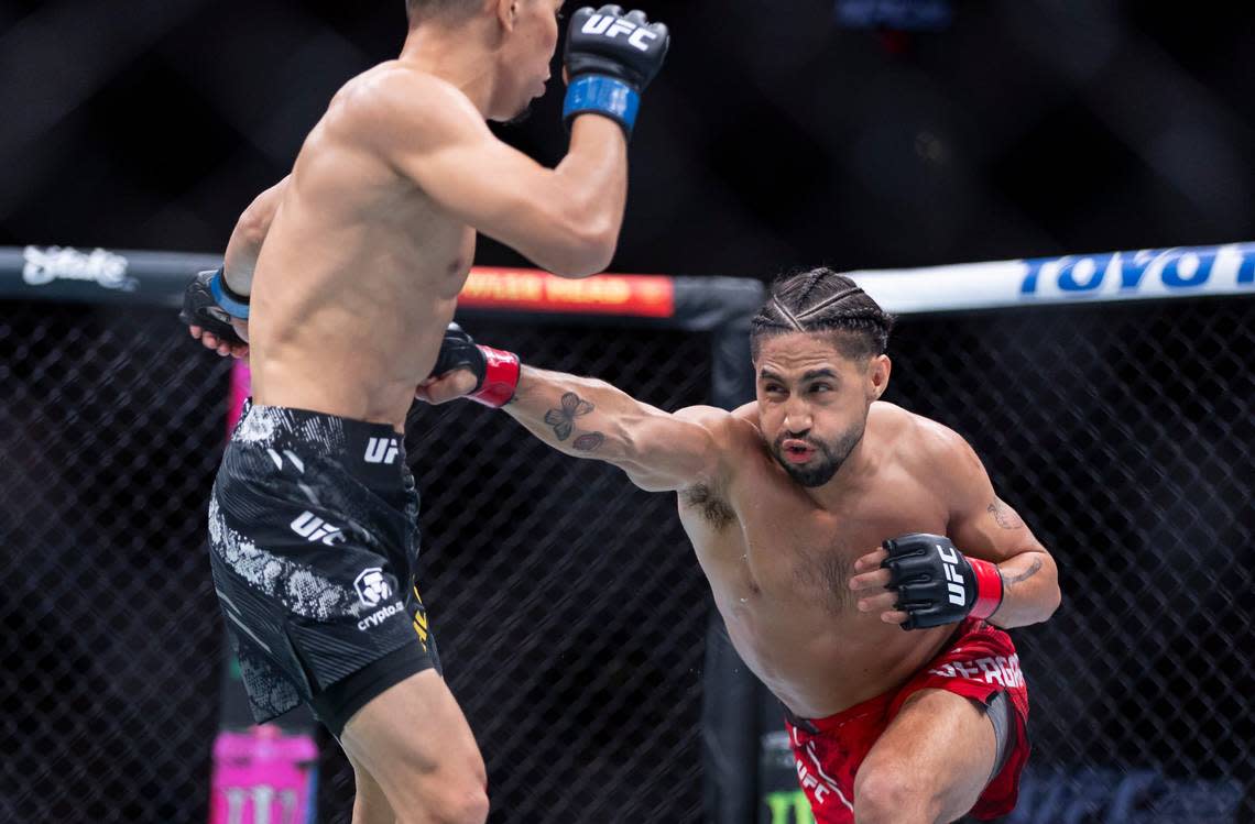 CJ Vergara from the United States and Asu Almabayev from Kazakhstan fight during their flyweight title match during the UFC 299 event at the Kaseya Center on Saturday, March 9, 2024, in downtown Miami, Fla.