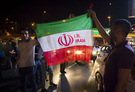 Iranians celebrate on the streets following a nuclear deal with major powers, in Tehran July 14, 2015. REUTERS/TIMA