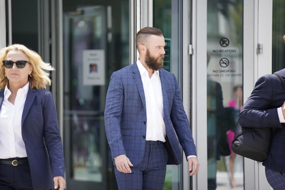 Cade Cothren leaves the federal courthouse Tuesday, Aug. 23, 2022