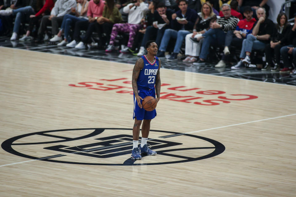 LOS ANGELES, CA - MARCH 08: LA Clippers guard Lou Williams (23) sits at half court during the Los Angeles Lakers game versus the Los Angeles Clippers on Sunday March 8, 2020, at Staples Center in Los Angeles, CA. (Photo by Jevone Moore/Icon Sportswire via Getty Images)