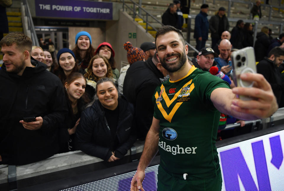 Australia's James Tedesco takes a selfie with fans following Kangaroo's Rugby League World Cup win over Fiji