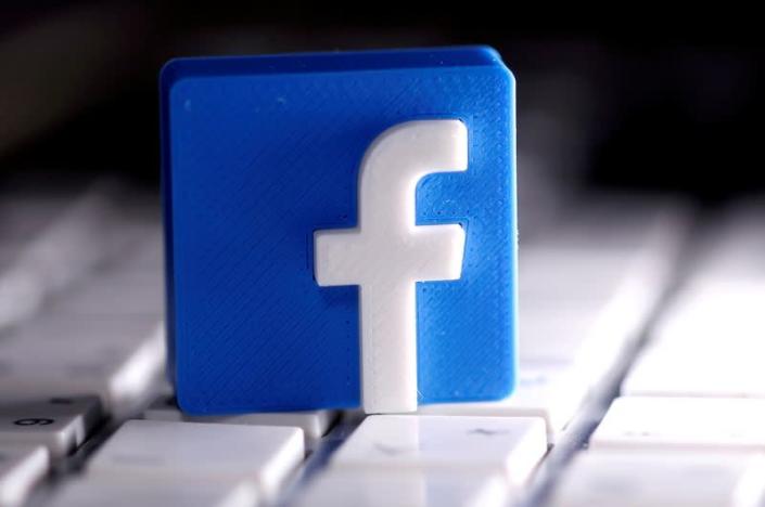 FILE PHOTO: FILE PHOTO: A 3D-printed Facebook logo is seen placed on a keyboard in this illustration