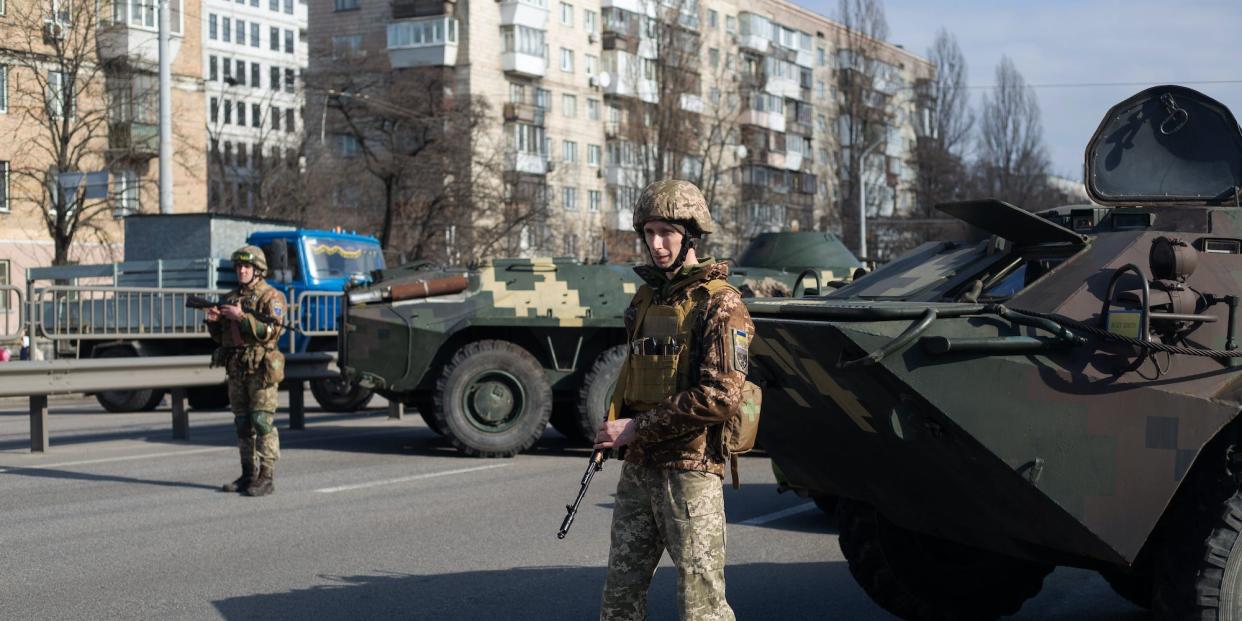 Soldiers guard Kyiv in Ukraine during Russia's invasion on February 25, 2022.