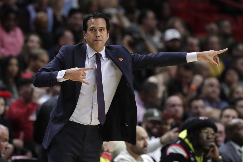 Miami Heat head coach Erik Spoelstra watches during the first half of an NBA basketball game against the Washington Wizards, Wednesday, Jan. 22, 2020, in Miami. The Heat won 134-129 in overtime. (AP Photo/Lynne Sladky)