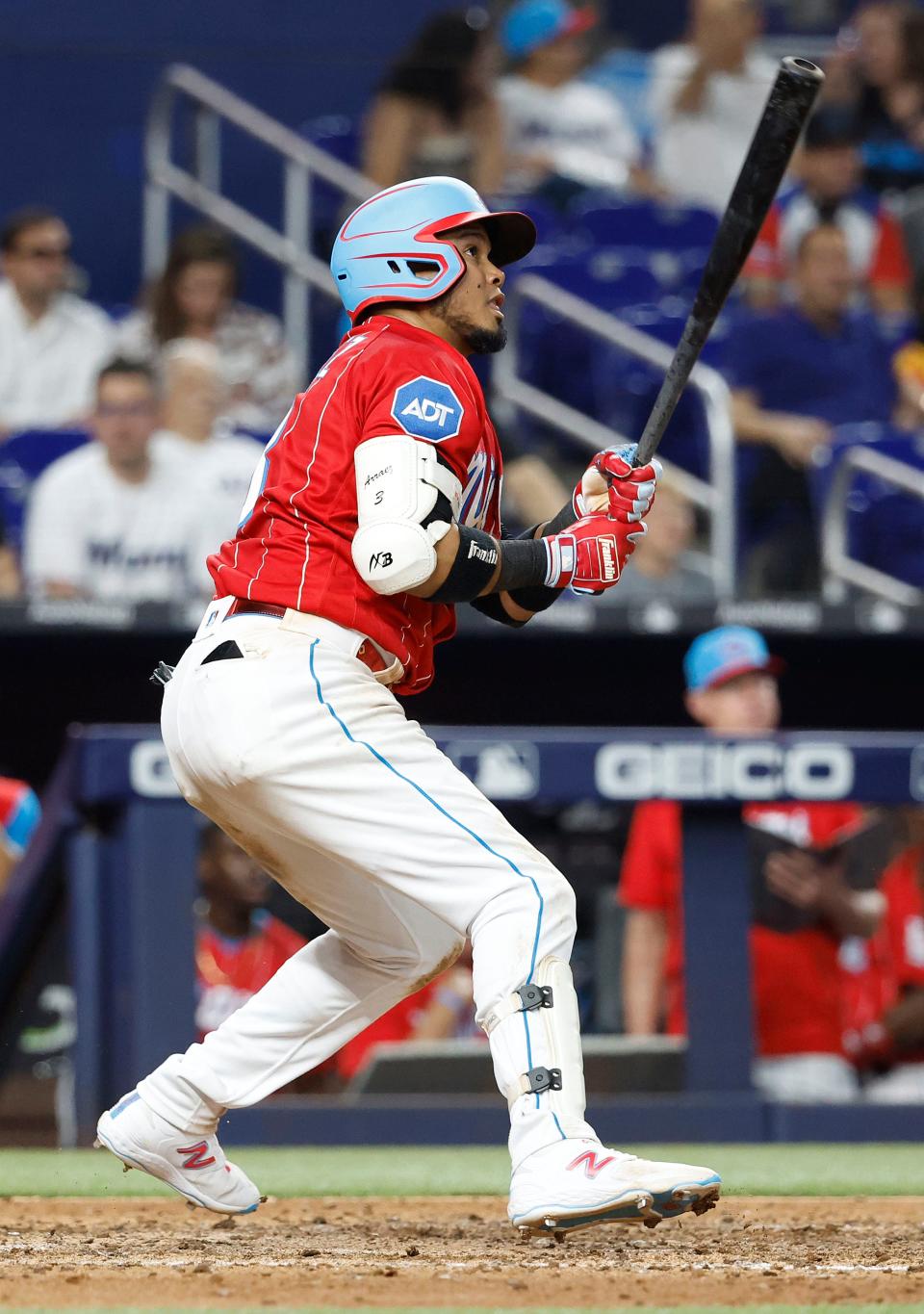 Jun 3, 2023; Miami, Florida, USA; Miami Marlins second baseman Luis Arraez (3) doubles against the Oakland Athletics during the seventh inning at LoanDepot Park.