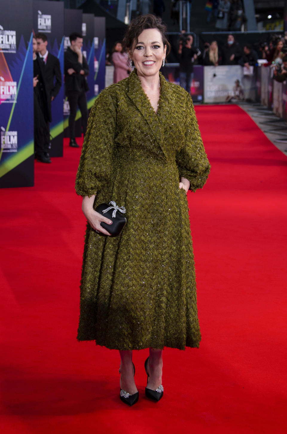 FILE - Olivia Colman arrives at the premiere of "The Lost Daughter" during the BFI London Film Festival in London, on Oct. 13, 2021. Colman turns 48 on Jan 30. (Photo by Joel C Ryan/Invision/AP, File)