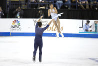 Jessica Calalang and Brian Johnson compete in the senior pairs free skate program at the U.S. Figure Skating Championships, Saturday, Jan. 25, 2020, in Greensboro, N.C. (AP Photo/Lynn Hey)