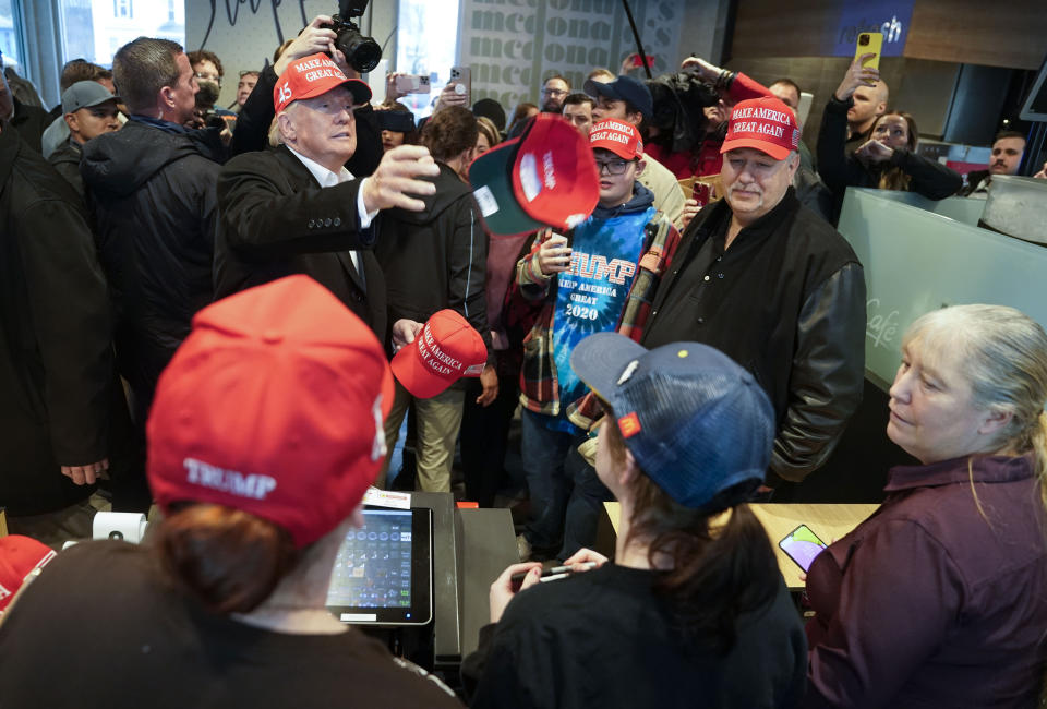 East Palestine, Ohio - February 22: Former President Donald Trump hands out Make America Great Again hats to McDonalds employees on Wednesday, February 22, 2023 in East Palestine, Ohio, following the Feb. 3 Norfolk Southern freight train derailment. 

(Photo by Jabin Botsford/The Washington Post via Getty Images)