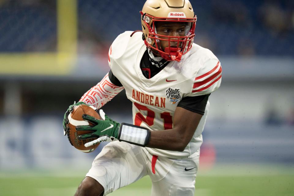 Andrean Fighting 59ers Patrick Clacks III (21) runs the ball during the IHSAA Class 2A state championships Friday, Nov 25, 2022 at Lucas Oil Stadium in Indianapolis.