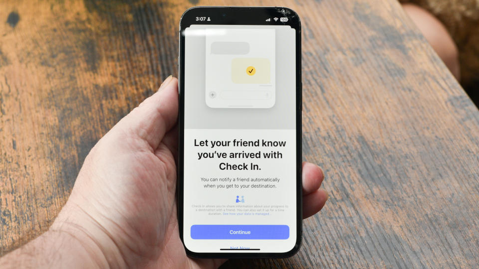 Apple iPhone showing new iOS 17 check in feature in Messages app