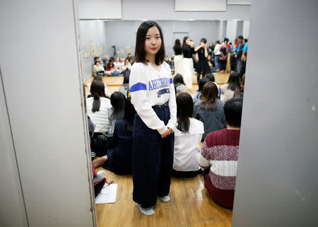 Yuri Harada (19), a student at Waseda University, poses for a photograph during club activities at her university in Tokyo, Japan April 9, 2019. Picture taken April 9, 2019. REUTERS/Issei Kato