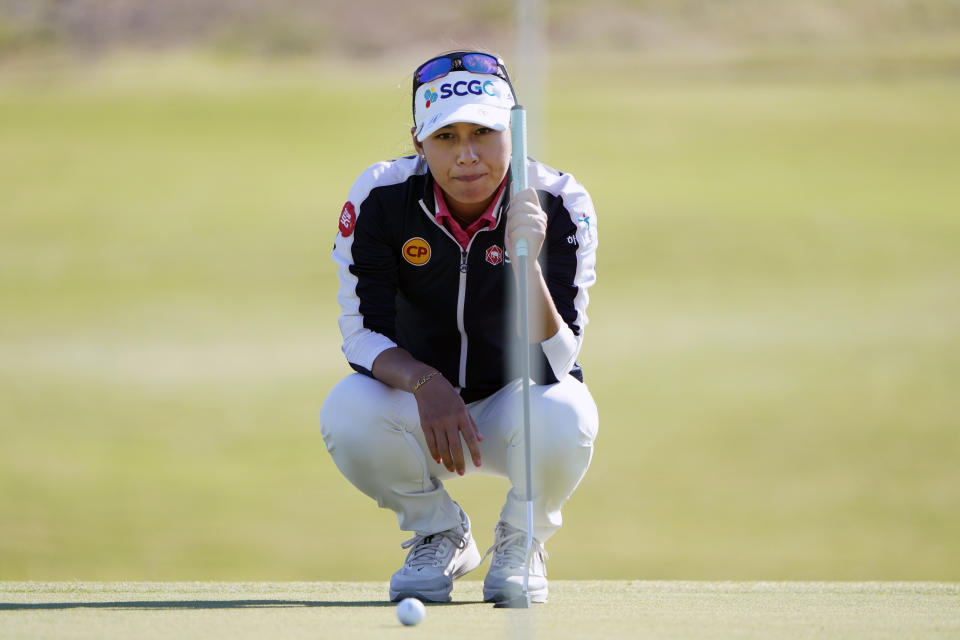 Atthaya Thitikul lines up a putt on the eighth hole during The Ascendant golf tournament in The Colony, Texas, Friday, Sept. 30, 2022. (AP Photo/LM Otero)