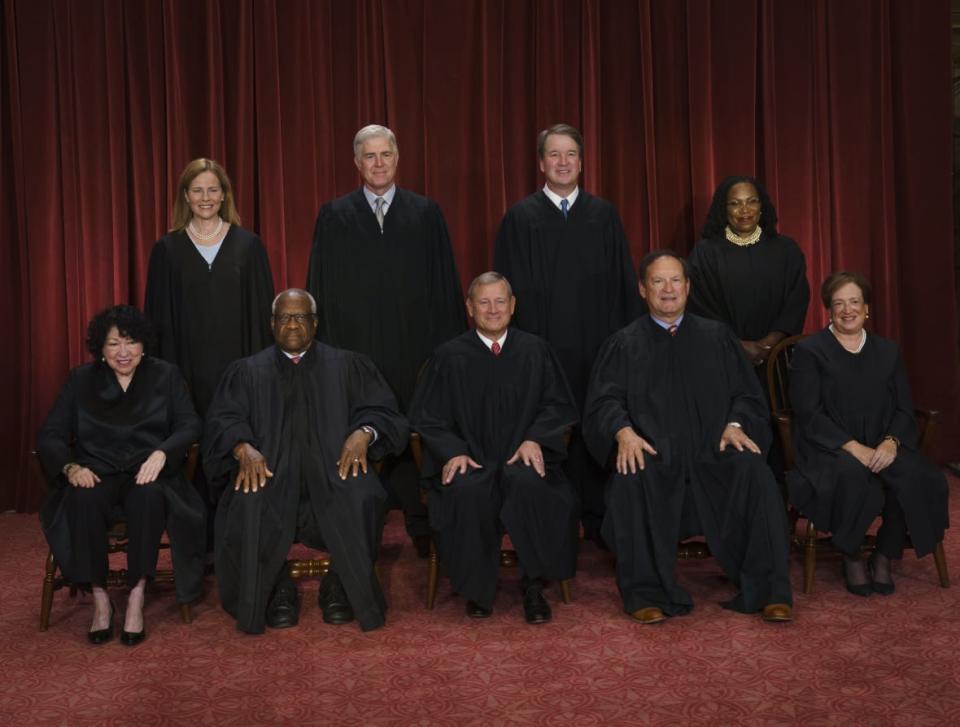 Oct 7, 2022; Washington, DC, USA; Members of the Supreme Court pose for a group photo at the Supreme Court. Seated from left: Associate <span class="caas-xray-inline-tooltip"><span class="caas-xray-inline caas-xray-entity caas-xray-pill rapid-nonanchor-lt" data-entity-id="Sonia_Sotomayor" data-ylk="cid:Sonia_Sotomayor;pos:2;elmt:wiki;sec:pill-inline-entity;elm:pill-inline-text;itc:1;cat:Judge;" tabindex="0" aria-haspopup="dialog"><a href="https://search.yahoo.com/search?p=Sonia%20Sotomayor" data-i13n="cid:Sonia_Sotomayor;pos:2;elmt:wiki;sec:pill-inline-entity;elm:pill-inline-text;itc:1;cat:Judge;" tabindex="-1" data-ylk="slk:Justice Sonia Sotomayor;cid:Sonia_Sotomayor;pos:2;elmt:wiki;sec:pill-inline-entity;elm:pill-inline-text;itc:1;cat:Judge;" class="link ">Justice Sonia Sotomayor</a></span></span>, Associate Justice Clarence Thomas, Chief Justice of the United States John G. Roberts, Jr., Associate Justice Samuel A. Alito, Jr. and Associate Justice Elena Kagan Standing behind from left: Associate Justice Amy Coney Barrett, Associate Justice Neil M. Gorsuch, Associate Justice Brett M. Kavanaugh and Associate Justice <span class="caas-xray-inline-tooltip"><span class="caas-xray-inline caas-xray-entity caas-xray-pill rapid-nonanchor-lt" data-entity-id="Ketanji_Brown_Jackson" data-ylk="cid:Ketanji_Brown_Jackson;pos:3;elmt:wiki;sec:pill-inline-entity;elm:pill-inline-text;itc:1;cat:Judge;" tabindex="0" aria-haspopup="dialog"><a href="https://search.yahoo.com/search?p=Ketanji%20Brown%20Jackson" data-i13n="cid:Ketanji_Brown_Jackson;pos:3;elmt:wiki;sec:pill-inline-entity;elm:pill-inline-text;itc:1;cat:Judge;" tabindex="-1" data-ylk="slk:Ketanji Brown Jackson;cid:Ketanji_Brown_Jackson;pos:3;elmt:wiki;sec:pill-inline-entity;elm:pill-inline-text;itc:1;cat:Judge;" class="link ">Ketanji Brown Jackson</a></span></span>. Mandatory Credit: Jack Gruber-USA TODAY