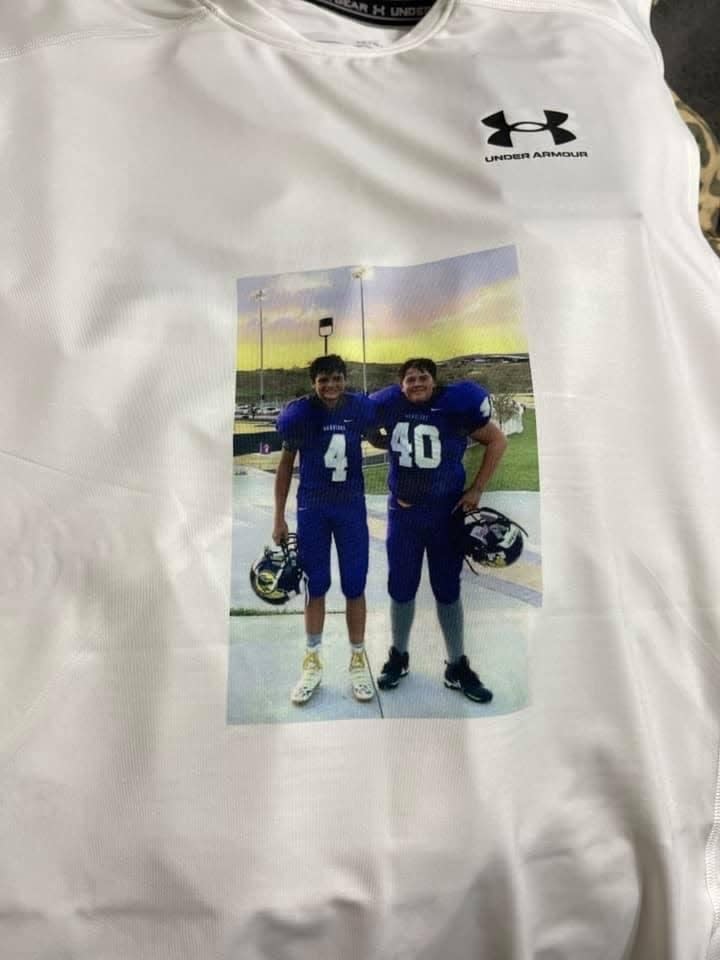 Miami's Haiden Thompson wears an image of himself and his best friend Jake Tolbert (right) on his undershirt during athletic events.