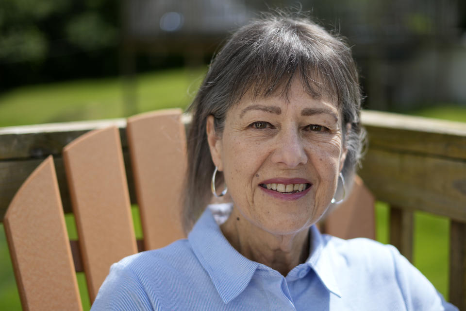 Susan Pryce sits on the back porch of her Derry, Pa., home, Saturday, May 11, 2024. A Democratic group is rolling out a new $140 million ad campaign this week that aims to chip away at Donald Trump’s support among one of his most loyal voting blocs: rural voters. Pryce, 74, a retired nurse, has offered a litany of reasons why she does not support Trump, from his comments maligning the late Sen. John McCain, a former prisoner of war, to his history of bragging about sexually abusing women.(AP Photo/Gene J. Puskar)