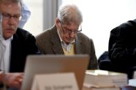 Former Auschwitz guard Reinhold Hanning (C) waits for the start of his trial at court in Detmold, western Germany on February 11, 2016