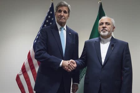 United States Secretary of State John Kerry (L) meets with Mohammad Javad Zarif, Minister of Foreign Affairs of Iran, at the United Nations in New York, September 26, 2015. REUTERS/Stephanie Keith