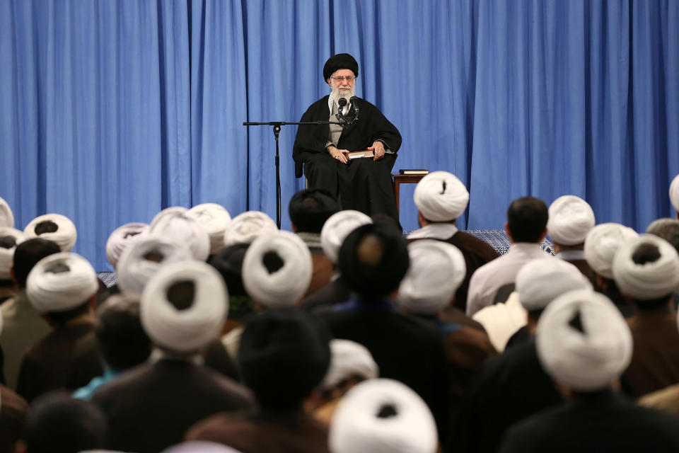 In this photo released by an official website of the office of the Iranian supreme leader, Supreme Leader Ayatollah Ali Khamenei speaks in a meeting in Tehran, Iran, Sunday, Feb. 23, 2020. Officials in Iran haven't announced the full results from parliamentary elections two days ago, but on Sunday the country's supreme leader accused enemy "propaganda" of trying to disuade people from voting by amplifying the threat of the coronavirus. (Office of the Iranian Supreme Leader via AP)