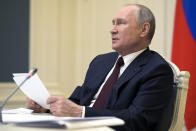 Russian President Vladimir Putin speaks as he attends the virtual Leaders Summit on Climate in Moscow, Russia, Thursday, April 22, 2021. (Alexei Druzhinin, Sputnik, Kremlin Pool Photo via AP)