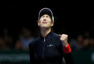 Tennis - WTA Tour Finals - Singapore Indoor Stadium, Singapore - October 22, 2017 Spain's Garbine Muguruza celebrates winning her group stage match with Latvia's Jelena Ostapenko REUTERS/Edgar Su