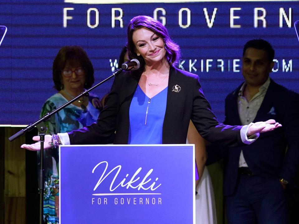 Democratic gubernatorial candidate Nikki Fried gestures after conceding the race to Rep. Charlie Crist on Tuesday, Aug. 23, 2022, in Fort Lauderdale, Florida.