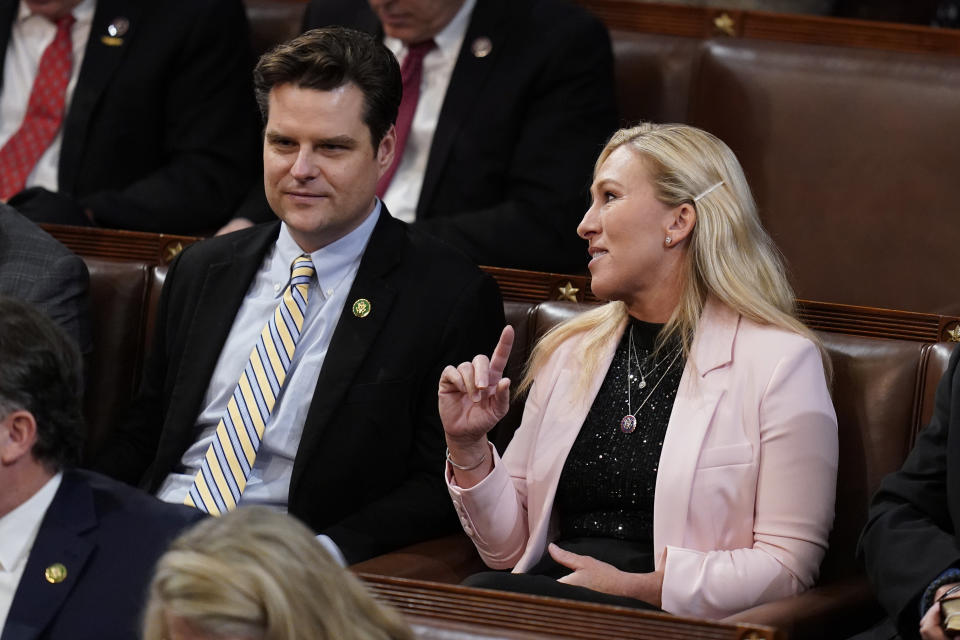 Rep. Marjorie Taylor Greene, R-Ga., talks with Rep. Matt Gaetz, R-Fla., in the House chamber as the House meets for the third day to elect a speaker and convene the 118th Congress in Washington, Thursday, Jan. 5, 2023. (AP Photo/Alex Brandon)