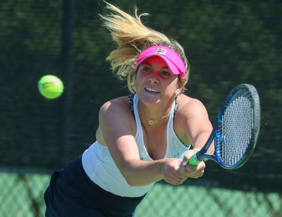 Wilmington Friends' Aubrey Nisbet hits a backhand on her way to winning the title at first singles during the DIAA state tennis championships at St. Andrew's School, Thursday May 25, 2023.