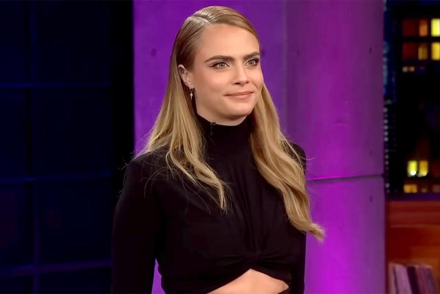 Cara Delevingne Supports Pregnant Rihanna at Super Bowl in Fenty Shirt