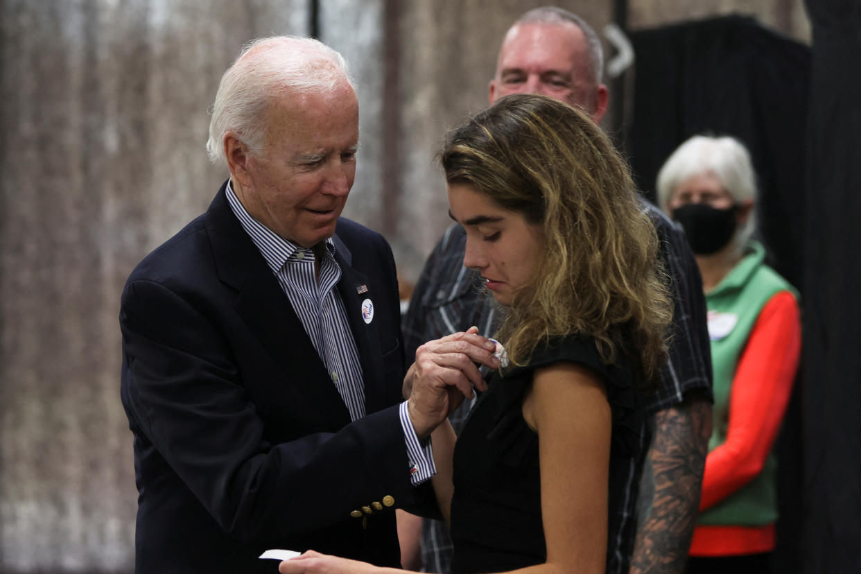 U.S. President Joe Biden reacts after casting his vote during early voting for the 2022 U.S. midterm elections with his granddaughter Natalie, a first-time voter, at a polling station in Wilmington, Delaware, U.S. October 29, 2022. REUTERS/Tasos Katopodis/Pool