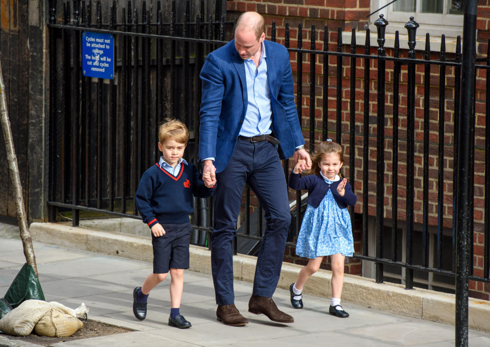 The Duke of Cambridge with Prince George and Princess Charlotte outside the Lindo Wing at St Mary's Hospital in Paddington, London. Photo credit should read: Matt Crossick/EMPICS Entertainment