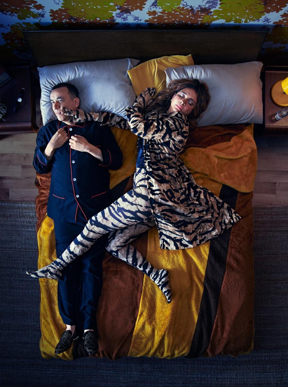 Pajamas, $600, by Olatz / Loafers, $1,295, by Christian Louboutin / On her: Coat, leggings, gloves by Dolce & Gabbana / Bodysuit by Fleur du Mal