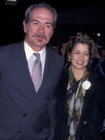 <p>Ron Galella, Ltd./Ron Galella Collection/Getty</p> Tommy Lee Jones and wife Dawn Laurel attend the premiere of 'U.S. Marshals' in 1998