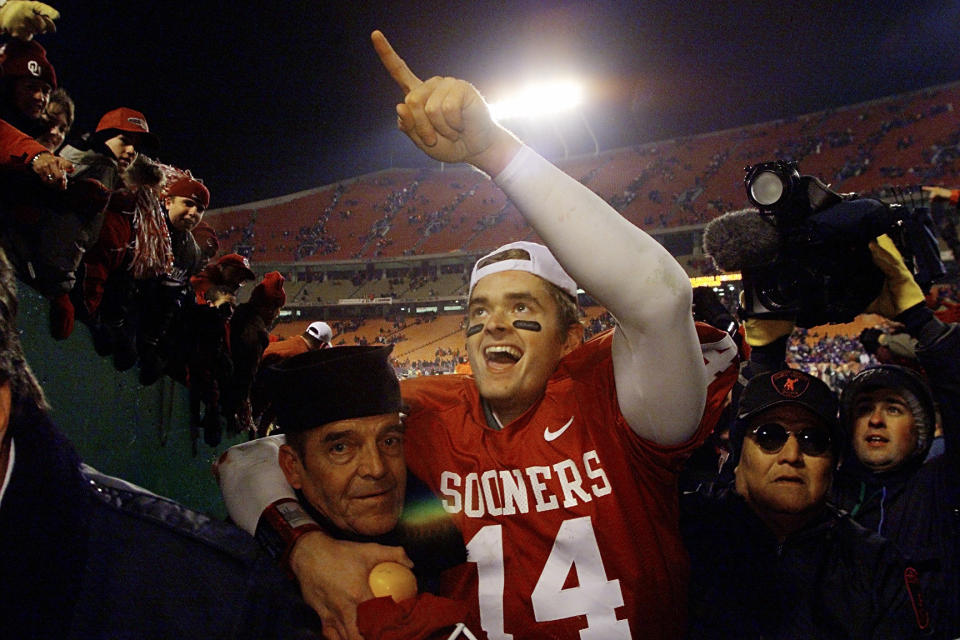 Dec. 2, 2000: Quarterback Josh Heupel #14 of the Oklahoma Sooners celebrates after defeating the Kansas State Wildcats 27-24 during the Big 12 Championship at Arrowhead Stadium in Kansas City, Missouri. Oklahoma will play for the national championship at the Orange Bowl. Brian Bahr/ALLSPORT