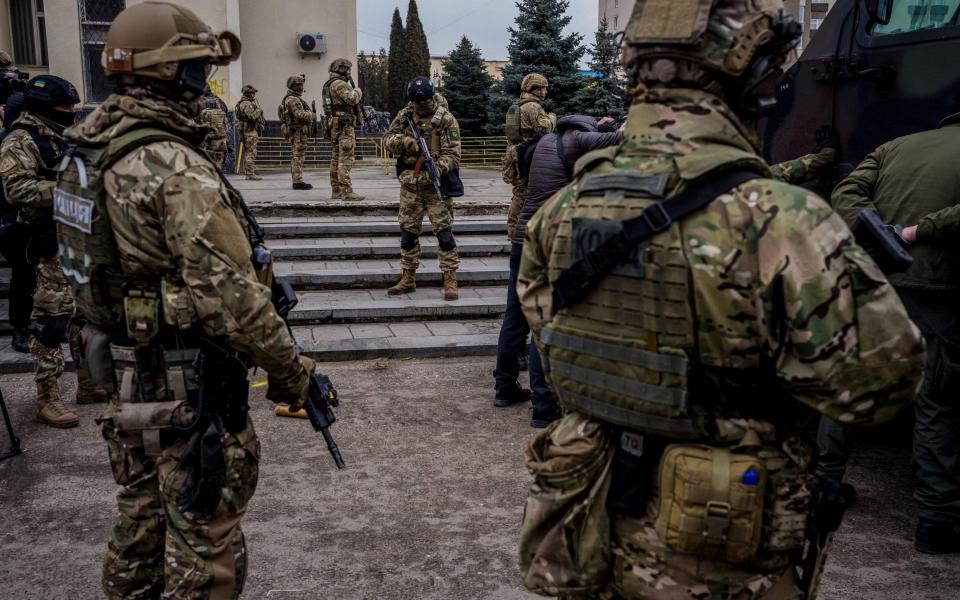 Ukrainian servicemen take part in a joint military training of armed forces, national guards, border guards and Security Service of Ukraine in Rivne region, near the border with Belarus, on February 11, 2023, amid the Russian invasion of Ukraine. (Photo by Dimitar DILKOFF / AFP) (Photo by DIMITAR DILKOFF/AFP via Getty Images) - DIMITAR DILKOFF/AFP via Getty Images