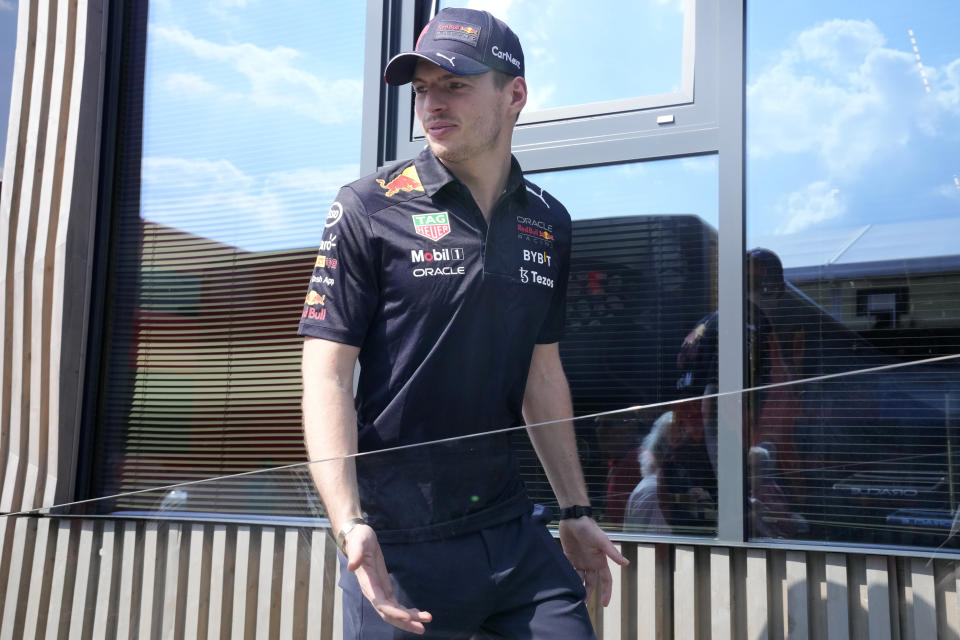 Red Bull driver Max Verstappen of the Netherlands walks through paddock at the Hungaroring racetrack in Mogyorod, near Budapest, Hungary, Thursday, July 28, 2022. The Hungarian Formula One Grand Prix will be held on Sunday. (AP Photo/Darko Bandic)