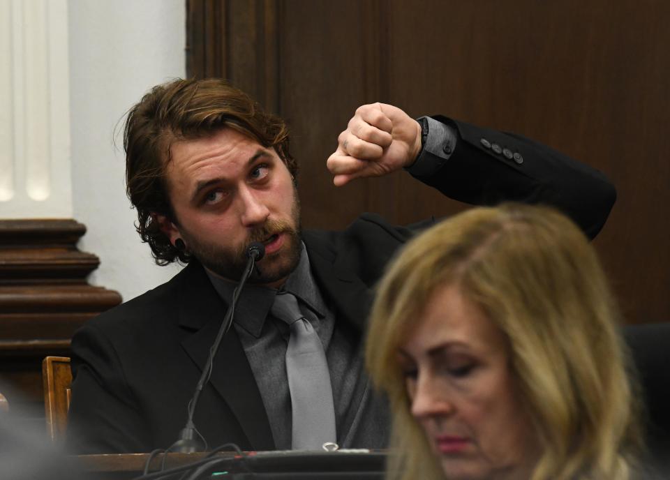Gaige Grosskreutz, who was shot by Kyle Rittenhouse, explains as a paramedic how to properly irrigate someone's eye after they have been pepper sprayed, during the Kyle Rittenhouse trial at the Kenosha County Courthouse on November 8, 2021 in Kenosha, Wisconsin. (Mark Hertzberg-Pool/Getty Images)