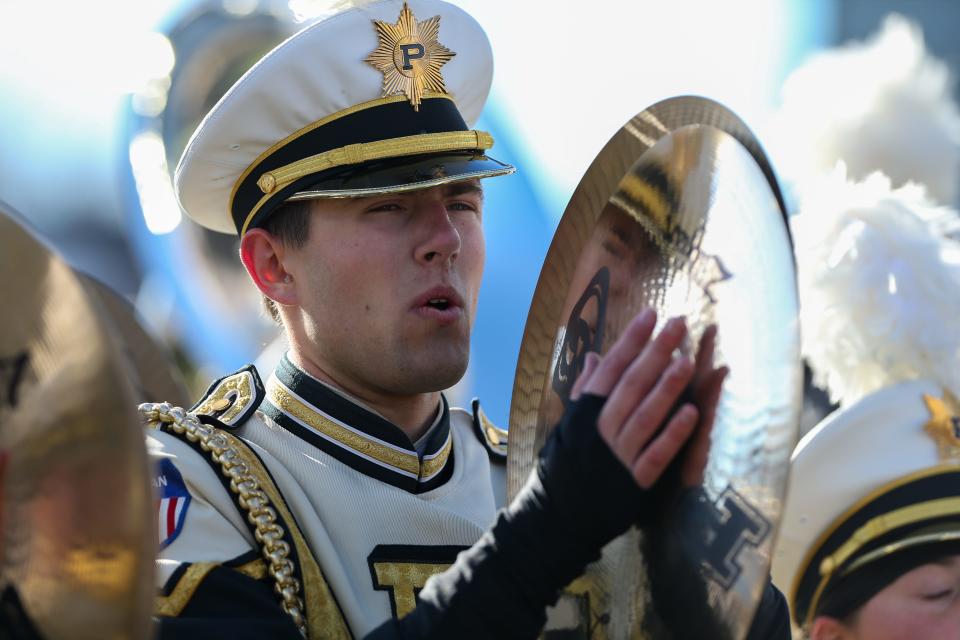 Purdue Boilermaker band enters the field before the NCAA football game, Saturday, Nov. 19, 2022, at Ross-Ade Stadium in West Lafayette, Ind.