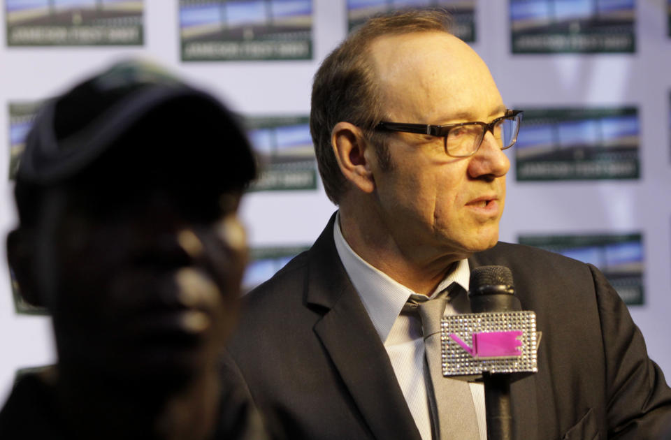 American actor Kevin Spacey arrives for the premiere of "Spirit Of A Denture" in Johannesburg, South Africa, Saturday, May 12, 2012. Spacey spoke about his international outlook during a brief visit to Johannesburg for the premiere of the South African short film he helped produce and in which he stars. (AP Photo/Denis Farrell)