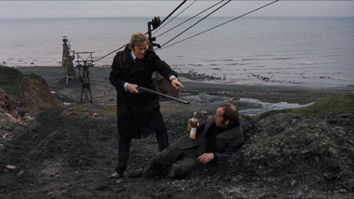 London.UK.  Michael Caine and Ian Hendry  in a scene in ©MGM film, Get Carter (1971)  Director: Mike Hodges Screenplay:Mike Hodges		 Source: Ted Lewis's novel Jack's Return Ref:LMK110-SLIB270220-001 Supplied by LMKMEDIA. Editorial Only. Landmark Media is not the copyright owner of these Film or TV stills but provides a service only for recognised Media outlets. pictures@lmkmedia.com